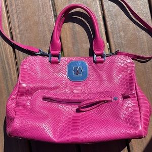 Longchamp pink soft-sided cross body bag.